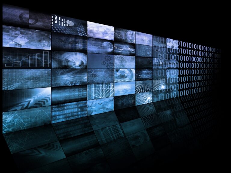 Blue abstract digital grid of mosaic screens displaying data visuals and binary code, conveying a high-tech information theme.